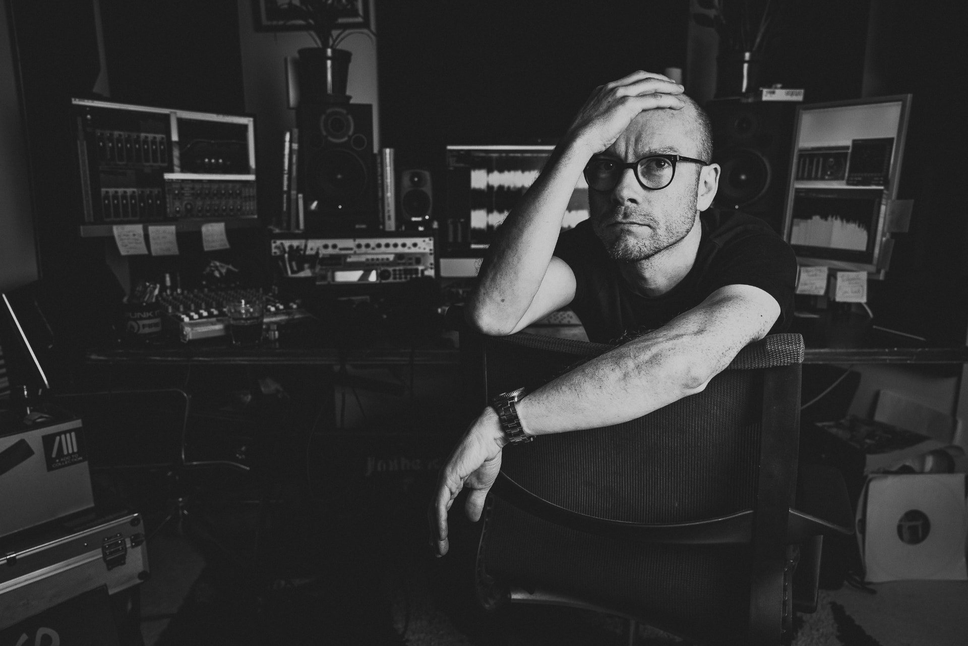 Chris Bailey in black and white at his studio desk